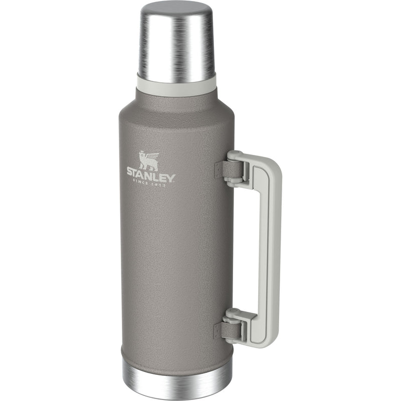 Load image into Gallery viewer, A gray Stanley vacuum-insulated water bottle with a matching gray handle and silver metal accents, shown on a plain white background.