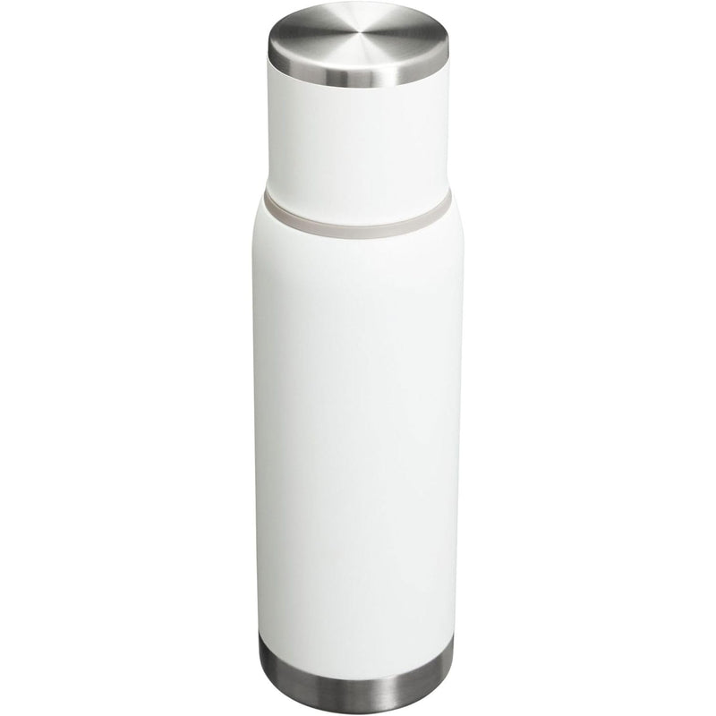 Load image into Gallery viewer, White insulated bottle with silver cap on a white background