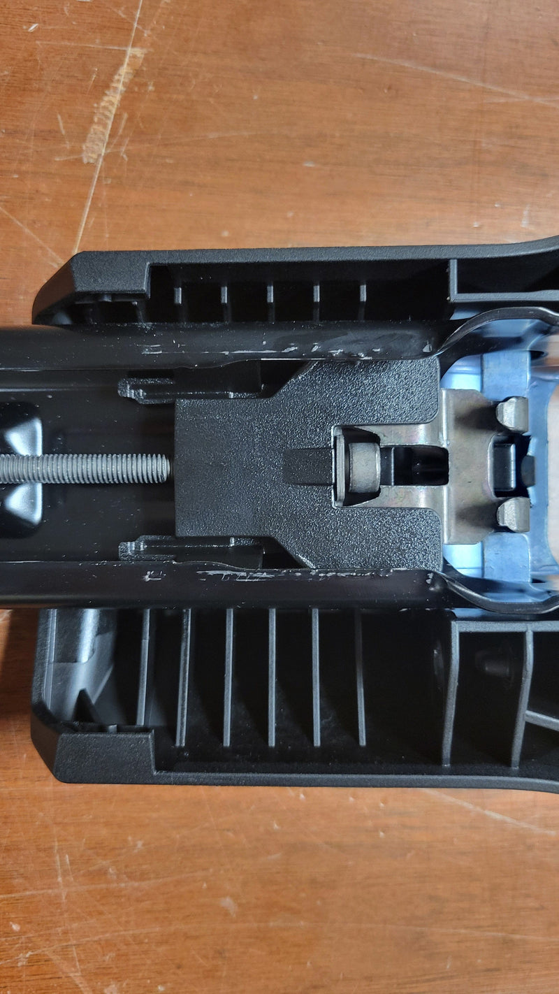 Load image into Gallery viewer, Black plastic component on a wooden surface
