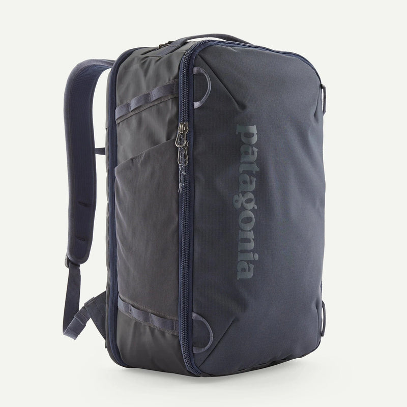 Load image into Gallery viewer, Navy and Gray backpack with Patagonia branding on a white background