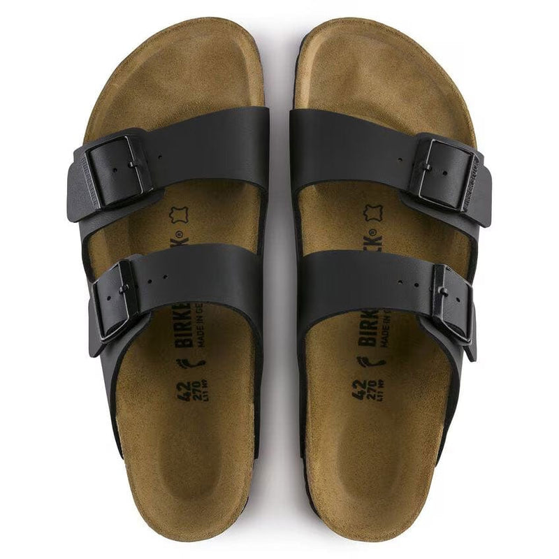 Load image into Gallery viewer, Pair of brown sandals with black straps on a white background