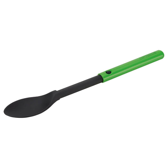 Black spoon with a green handle on a white background