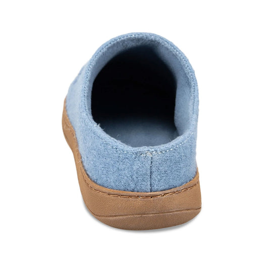 Close-up of a blue and brown slip-on shoe on a white background