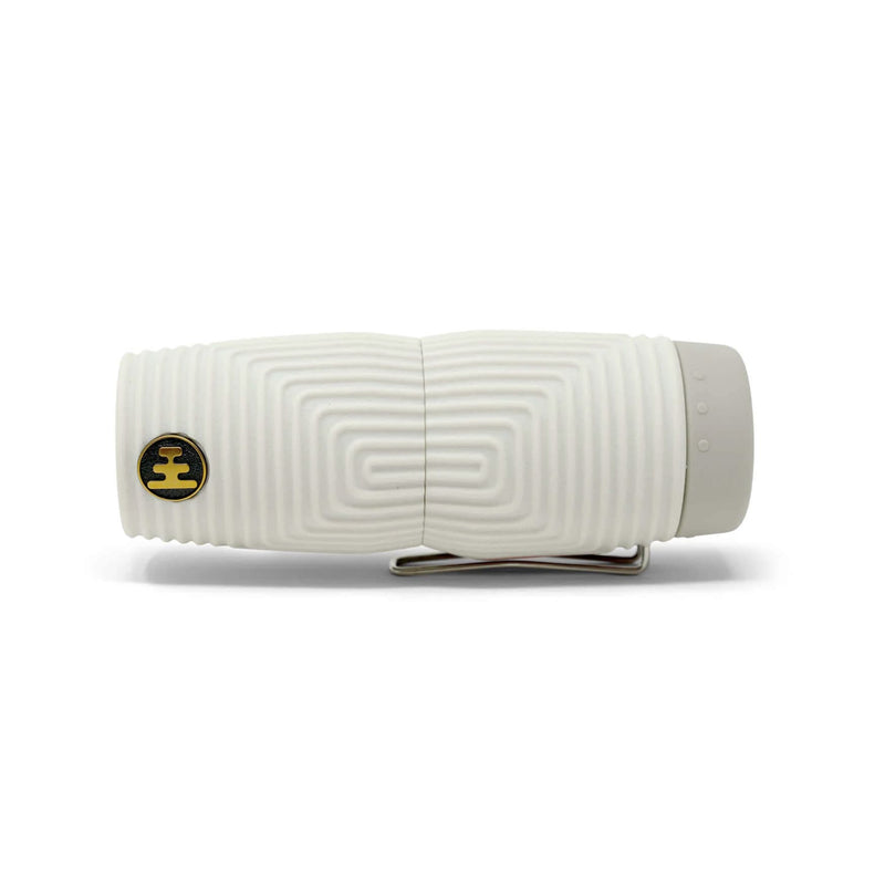 Load image into Gallery viewer, A white textured cylindrical tumbler with a geometric concentric pattern, a small circular gold and black logo on the left, and a silver metal clip at the base, shown on a white background.