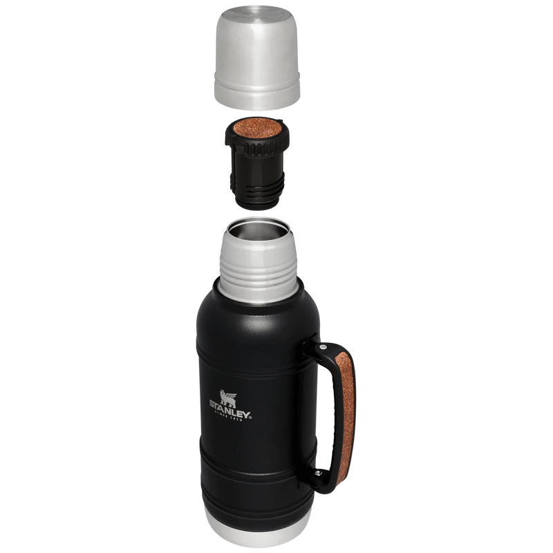 Load image into Gallery viewer, Black Stanley insulated mug with various lids on a white background