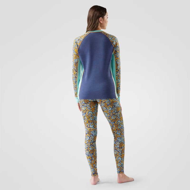 Load image into Gallery viewer, Woman wearing a patterned long-sleeve top and leggings on a white background