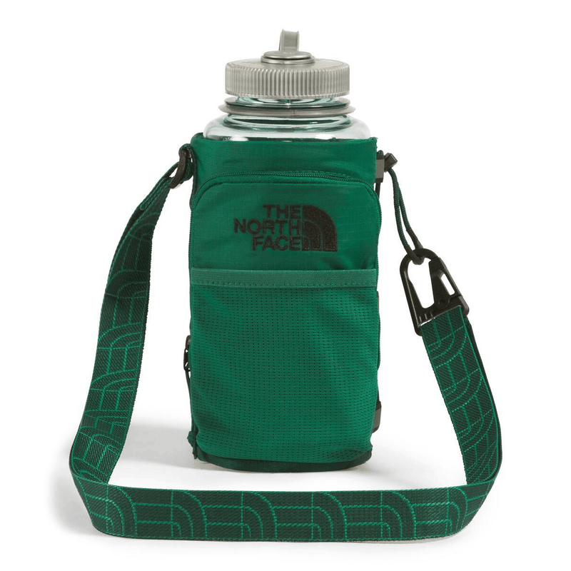 Load image into Gallery viewer, Green water bottle holder with strap featuring The North Face logo on a white background