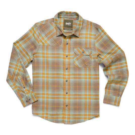 Plaid shirt with a visible brand label on a white background