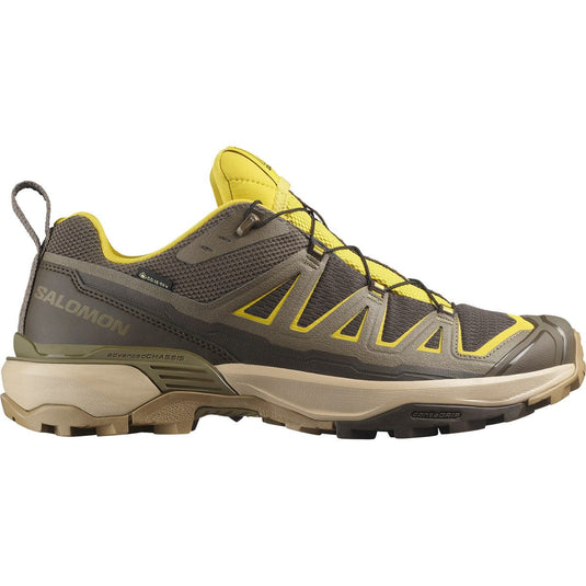 Salomon hiking shoe with gray and yellow design on a white background