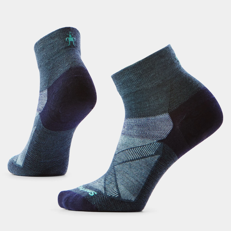 Load image into Gallery viewer, Pair of blue and black socks on a light gray background