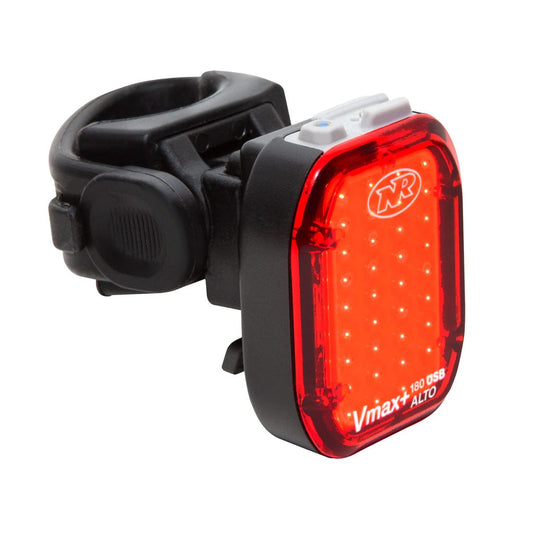 Red bicycle tail light with black clip on a white background