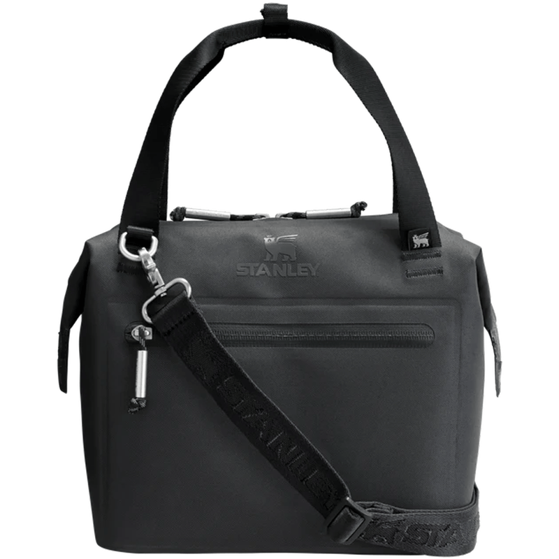 Load image into Gallery viewer, Black backpack with shoulder strap on a white background, featuring the Stanley logo.