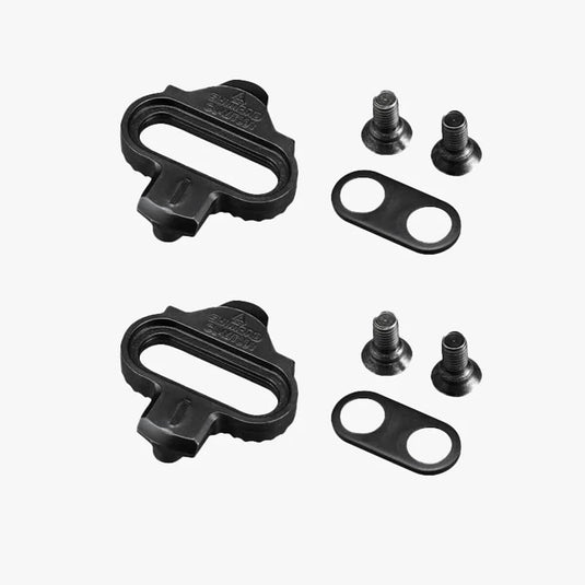 Black bicycle pedal set with additional components on a white background