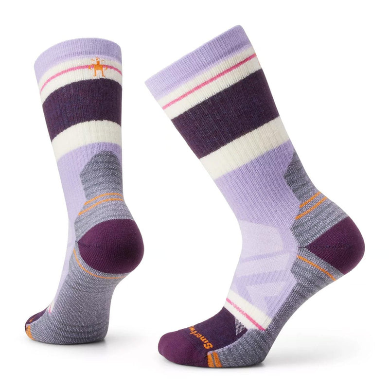 Load image into Gallery viewer, A pair of Smartwool women's hike crew socks with a geometric pattern in shades of purple, red, and gray.