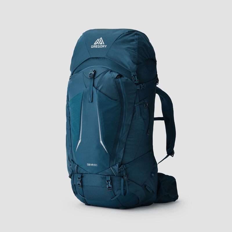 Load image into Gallery viewer, Blue hiking backpack with Gregory logo on a light gray background