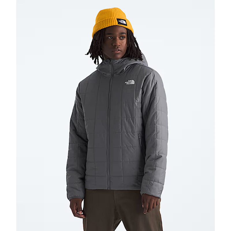 Load image into Gallery viewer, Person wearing a gray jacket and yellow beanie with The North Face logo on a white background