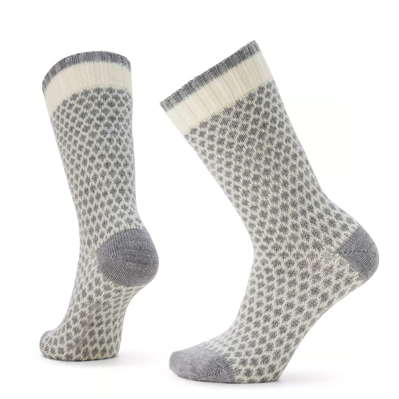Load image into Gallery viewer, A pair of Smartwool crew socks with a popcorn polka dot pattern in gray and beige colors.