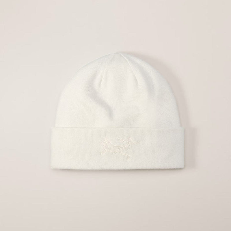 Load image into Gallery viewer, White beanie hat on a light pink background