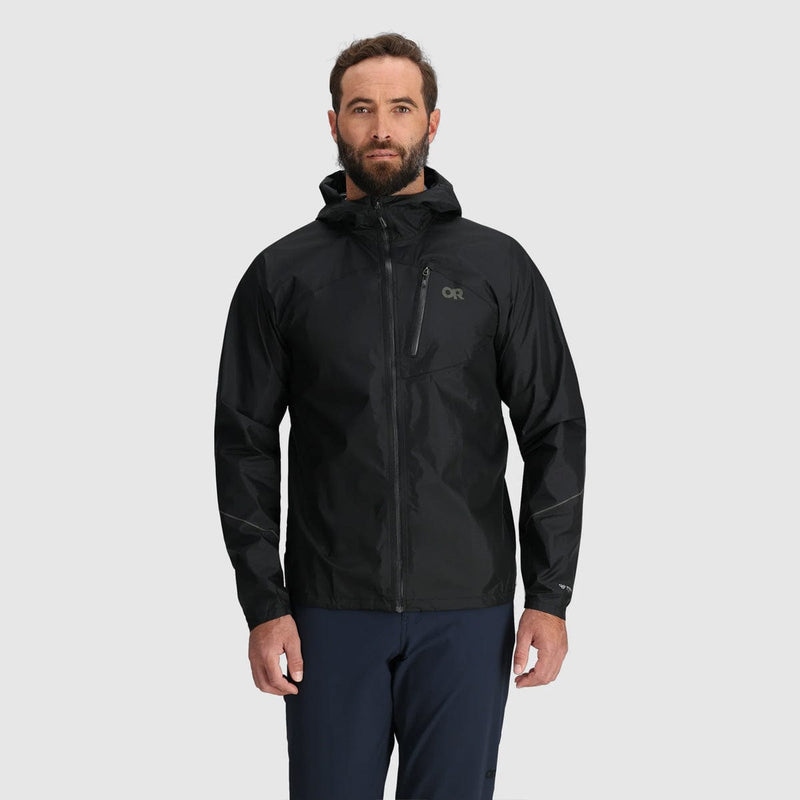 Load image into Gallery viewer, Man wearing a black jacket with a brand logo on a light gray background