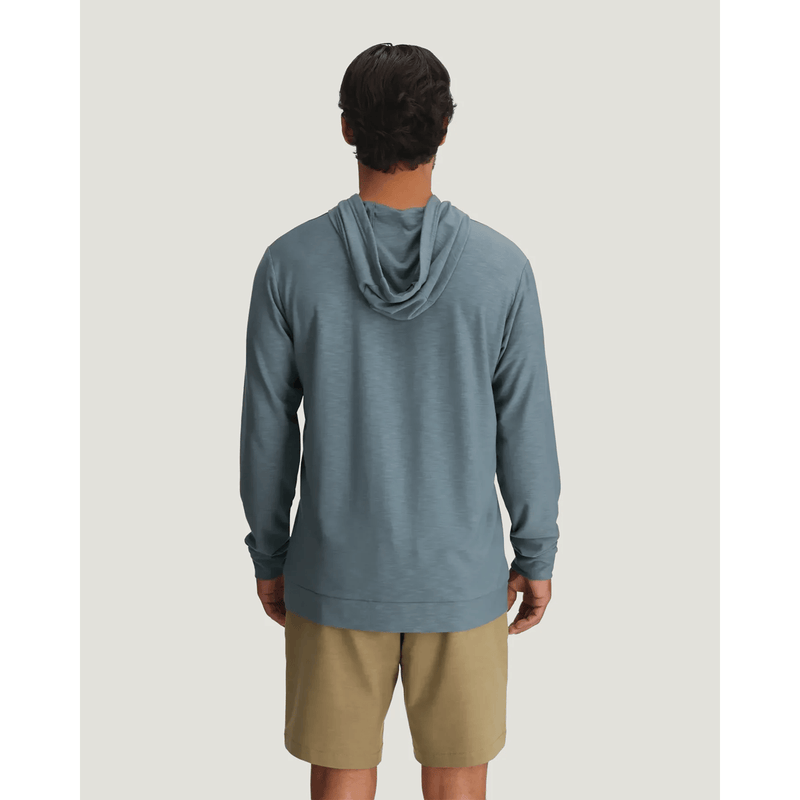 Load image into Gallery viewer, Person wearing a blue hoodie and beige shorts on a light gray background