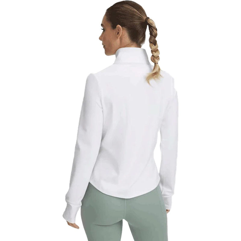 Load image into Gallery viewer, Woman wearing a white shirt and light green pants on a white background