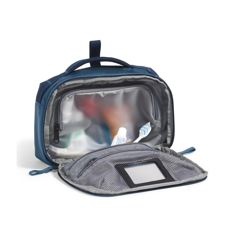 Load image into Gallery viewer, Open blue toiletry bag with mesh pocket on a white background