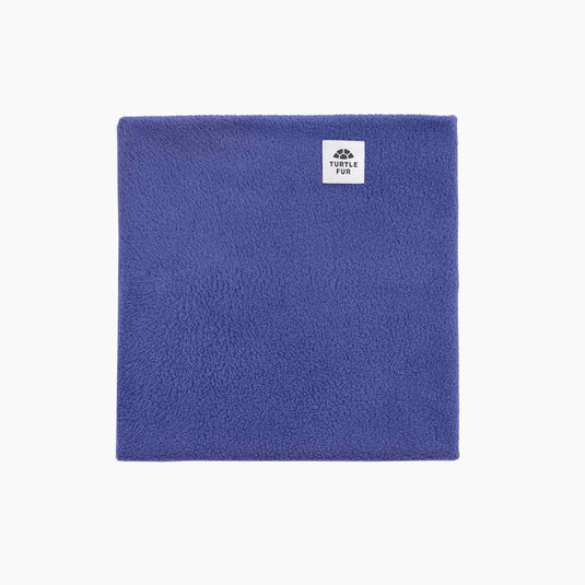 Blue towel with a brand logo on a white background