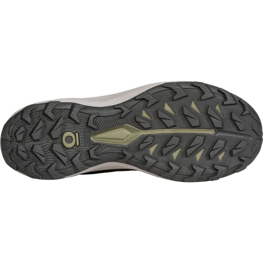 Close-up of a hiking shoe sole with tread pattern on a white background