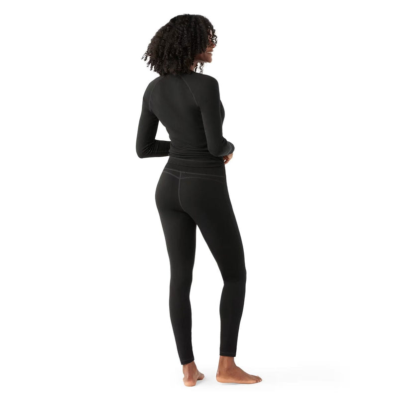 Load image into Gallery viewer, Person wearing black long-sleeve top and leggings on a white background