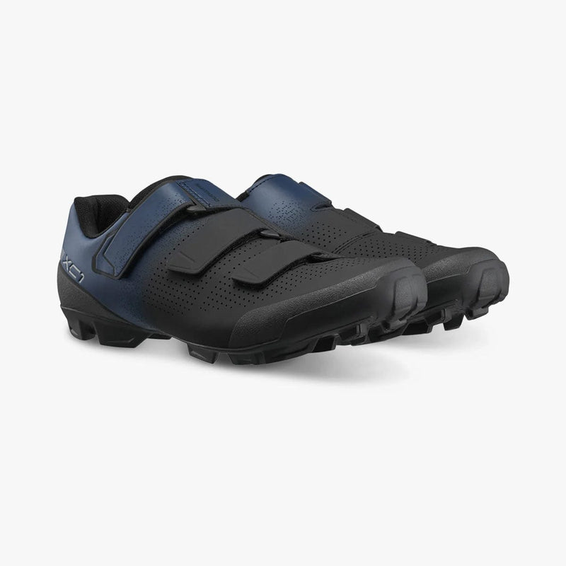 Load image into Gallery viewer, Pair of black and blue cycling shoes on a light gray background