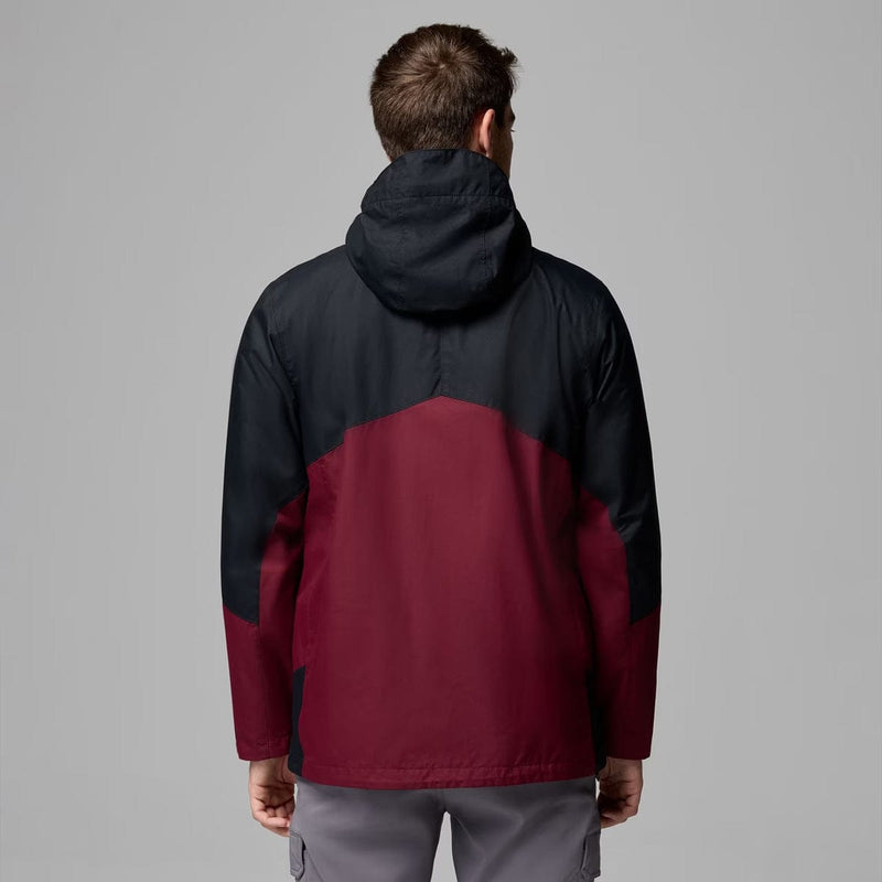 Load image into Gallery viewer, Person wearing a black and red jacket on a gray background