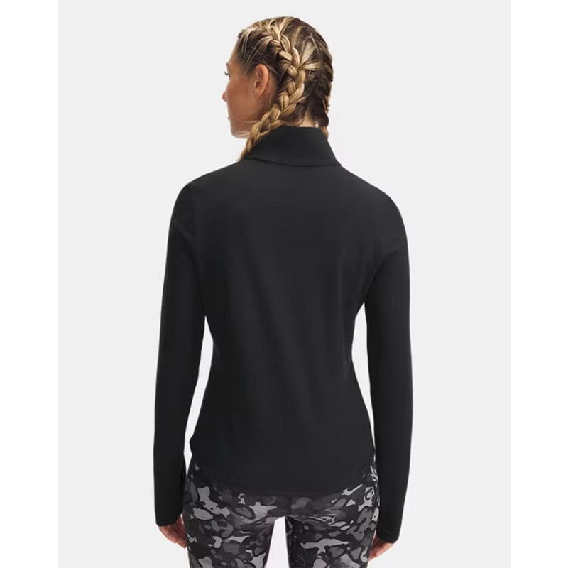 Load image into Gallery viewer, Person wearing a black long-sleeve top and patterned leggings on a white background