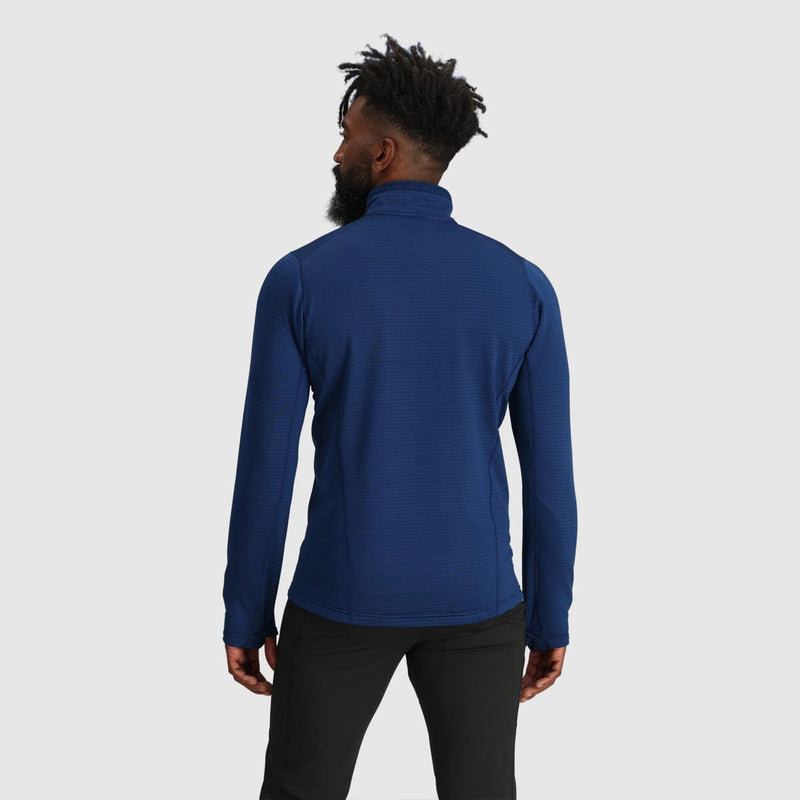 Load image into Gallery viewer, Person wearing a blue jacket on a light gray background