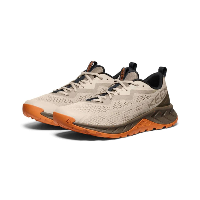 Load image into Gallery viewer, Beige and orange running shoes with 'Keen' branding on a white background
