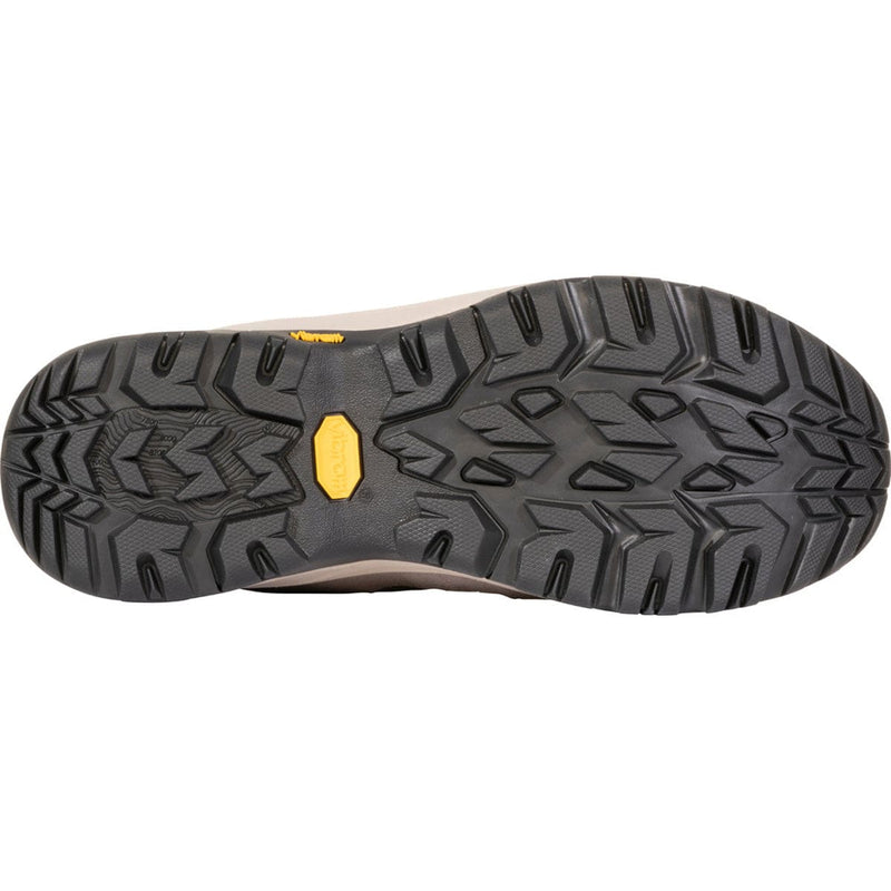 Load image into Gallery viewer, Close-up of a shoe sole with a textured pattern and a visible brand logo on a white background
