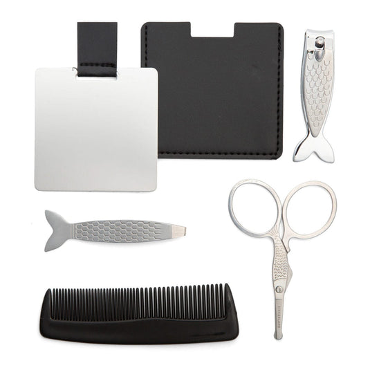 Set of grooming tools including a comb, scissors, and nail clippers on a white background