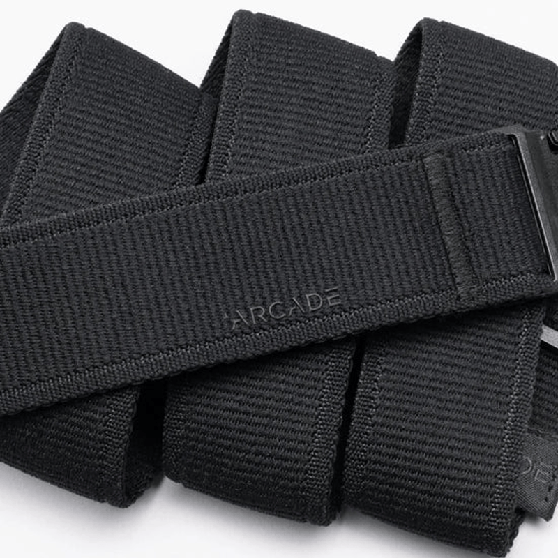 Load image into Gallery viewer, Black tactical belt with 'Arcade' branding on a white background