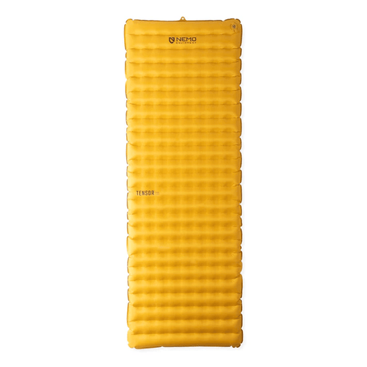 Yellow sleeping pad with Nemo Equipment branding on a white background