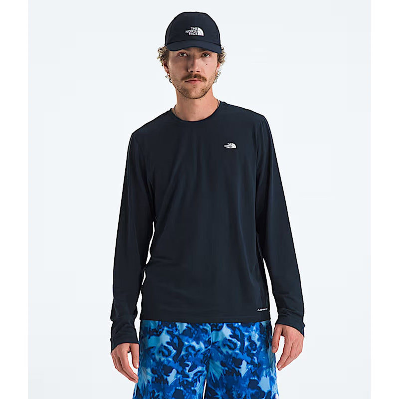 Load image into Gallery viewer, Man wearing a black long-sleeve shirt and blue camouflage shorts with a white background
