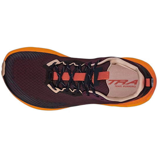 Trail running shoe with orange sole and maroon side on a white background