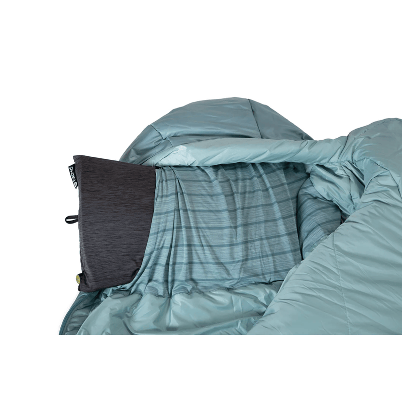 Load image into Gallery viewer, Teal sleeping bag with a black patch on a white background