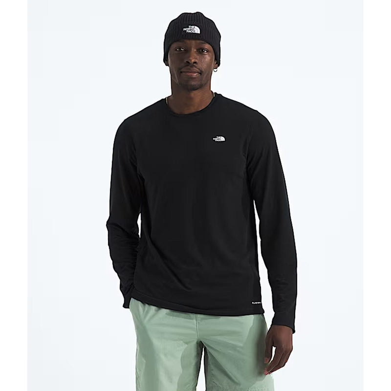 Load image into Gallery viewer, Man wearing a black long-sleeve shirt and light green pants on a white background