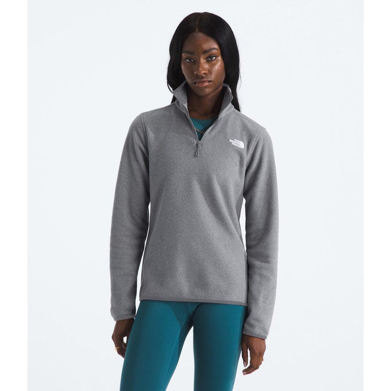 Load image into Gallery viewer, Woman wearing a gray pullover with a logo on a white background