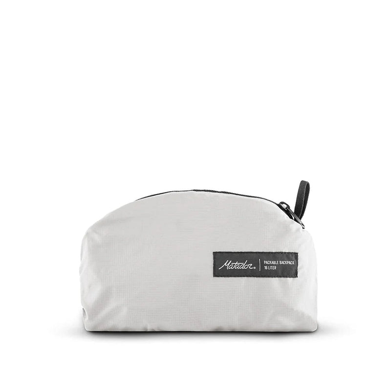 Load image into Gallery viewer, White pouch with a black zipper and label on a white background