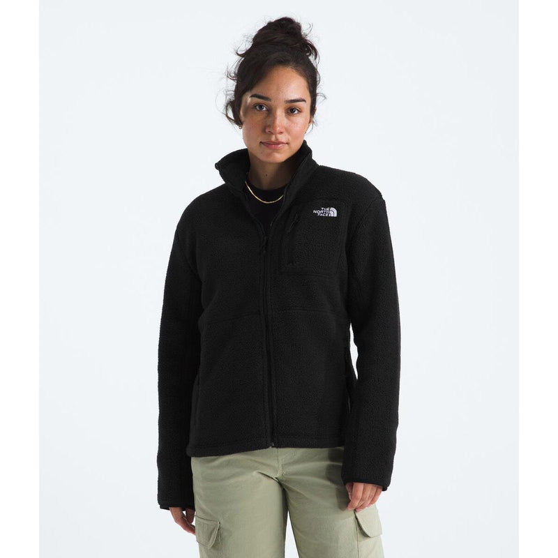 Load image into Gallery viewer, Woman wearing a black jacket with a brand logo on a white background