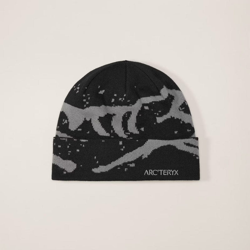 Load image into Gallery viewer, Black beanie with gray wolf design and Arc'teryx logo on a beige background