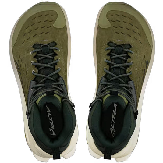 Pair of olive green running shoes with black laces on a white background