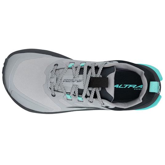 Gray and black running shoe with teal accents on a white background