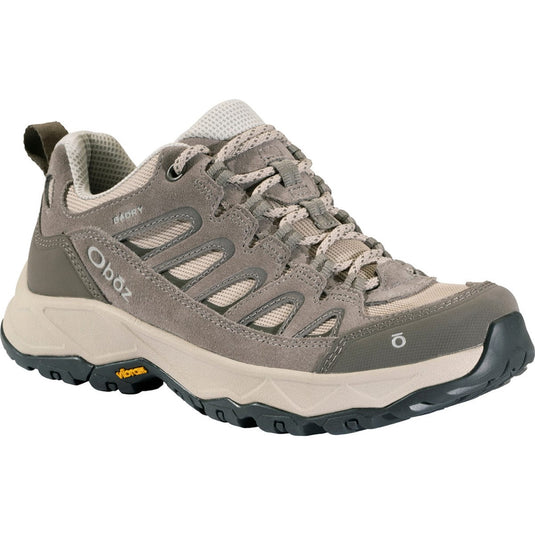 Gray hiking shoe with brand logo on a white background