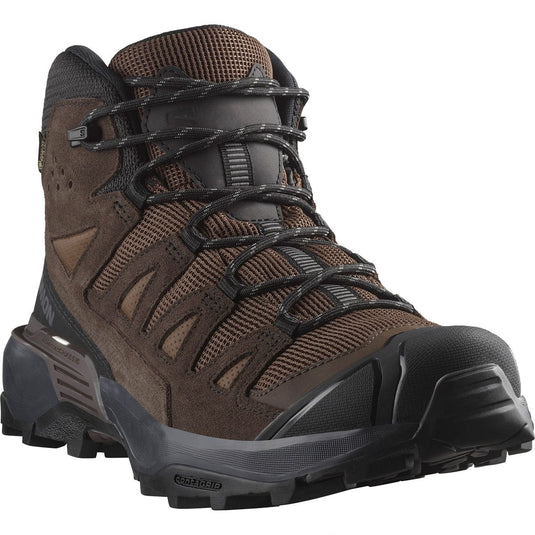 Brown hiking boot with black laces on a white background